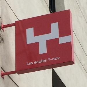 Enseigne drapeau caisson — JMJ Com, Villeurbanne et Lyon