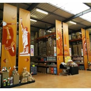 Signalétique de rayons et habillage de gondoles à l'intérieur d'un magasin